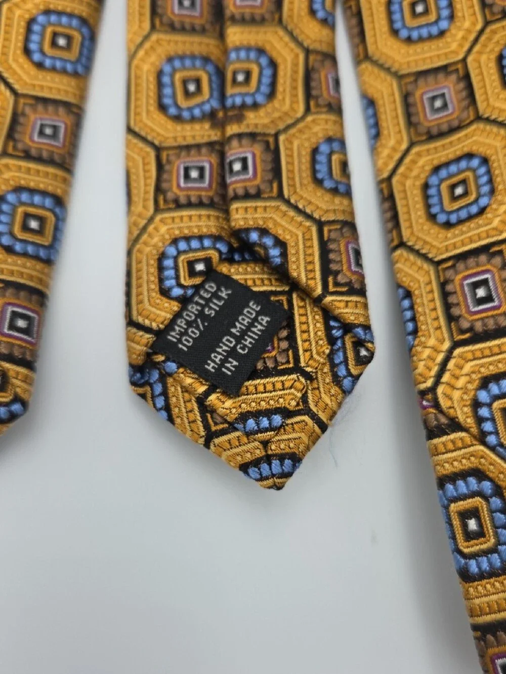 Jos. A. Bank Signature Collection Gold Geometric Silk Tie with Blue Accents
